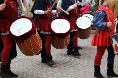 Palio, the city celebrates with competitions of the flag wavers and the parade of the districts clipart
