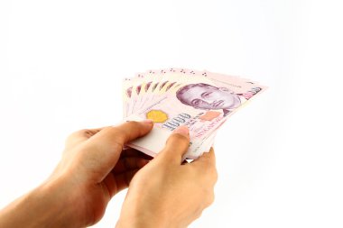 Hands holdingSingapore currency clipart
