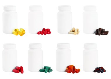 Kapsül bir beyaz plastik ilaç şişe yanındaki bir dizi.