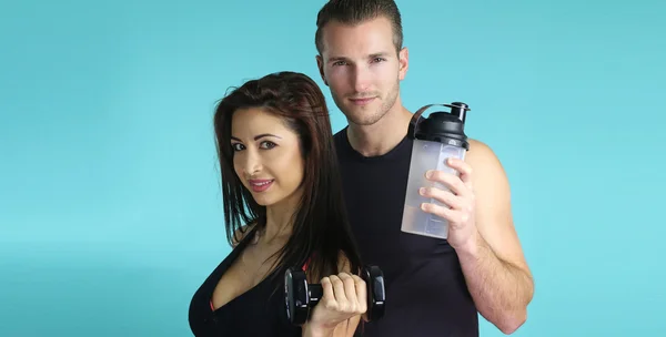 Fitness - Sporty couple posing — Stock Photo, Image