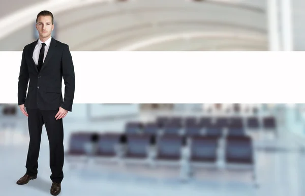 Security officer standing in an airport — Stock Photo, Image