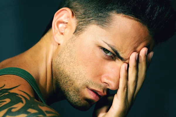 Handsome man with headache — Stock Photo, Image