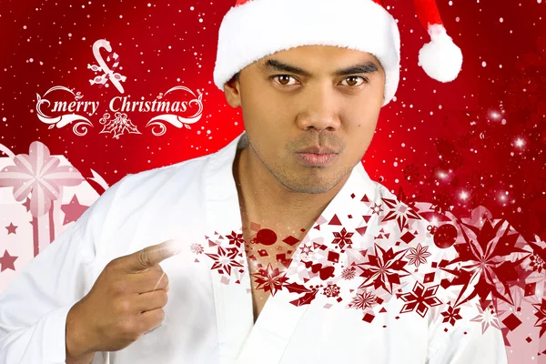 Bello asiatico uomo con un Santa cappello — Foto Stock