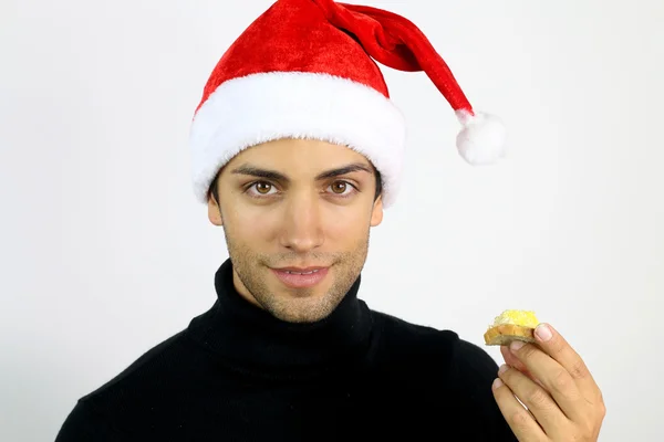 Joven comiendo un brindis de foie gras — Foto de Stock