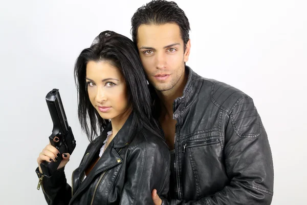 Perfect couple dressed in a black leather — Stock Photo, Image