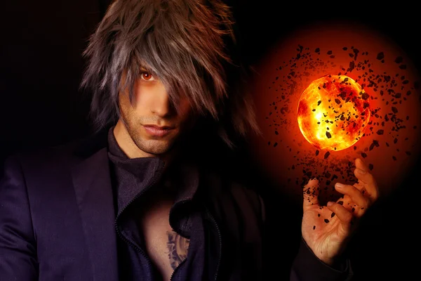 Handsome Wizard with a fireball — Stock Photo, Image