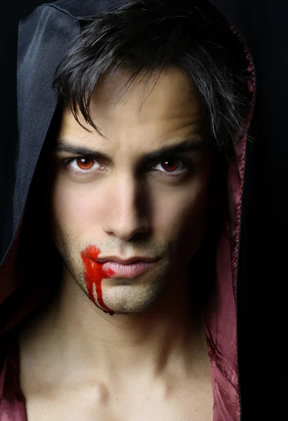 Portrait of a handsome young vampire — Stock Photo, Image
