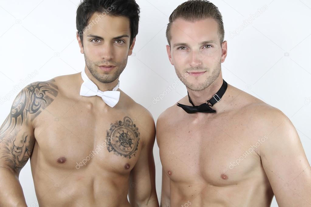 Two sexy guys wearing a bow tie