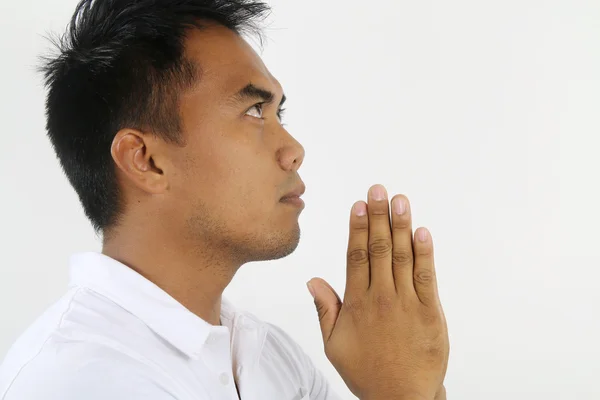 Mladý muž se modlí — Stock fotografie