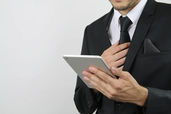 Zakenman met een tablet computer — Stockfoto