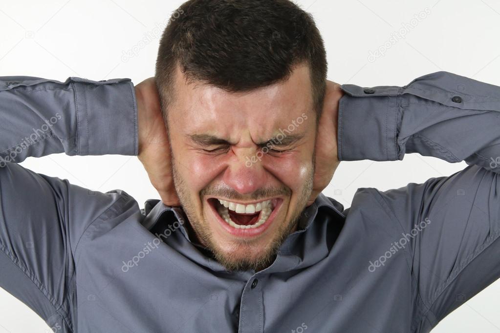 Man covering his ears Stock Photo by ©rdrgraphe 80310710