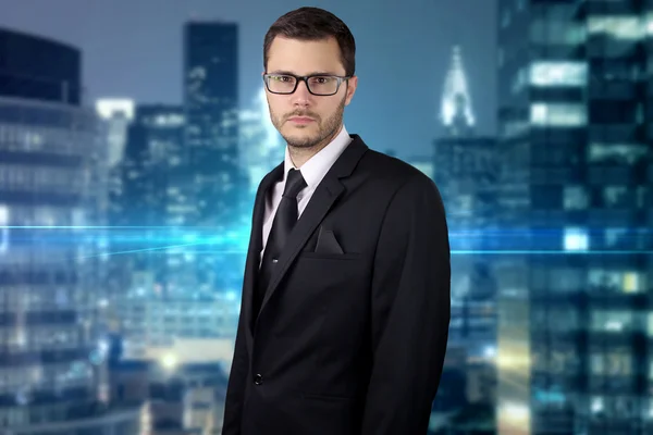 Young businessman in an office — Stock Photo, Image