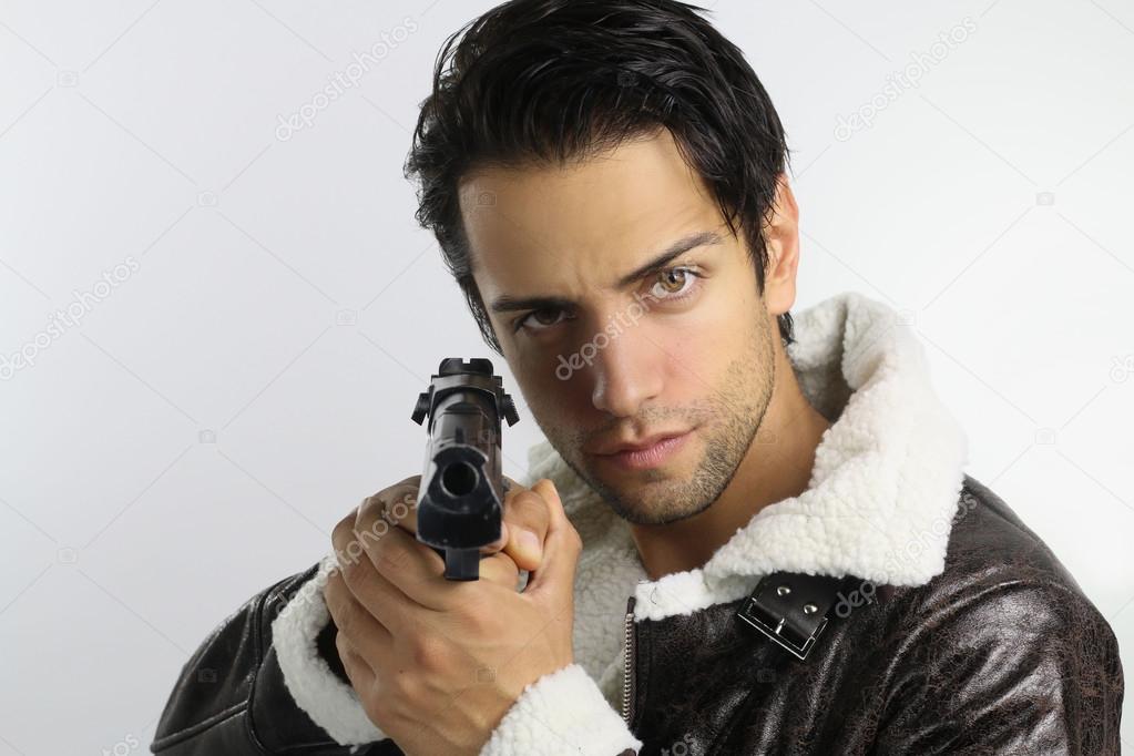 handsome guy holding a gun