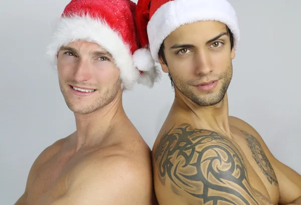 Twee sexy jonge santa — Stockfoto