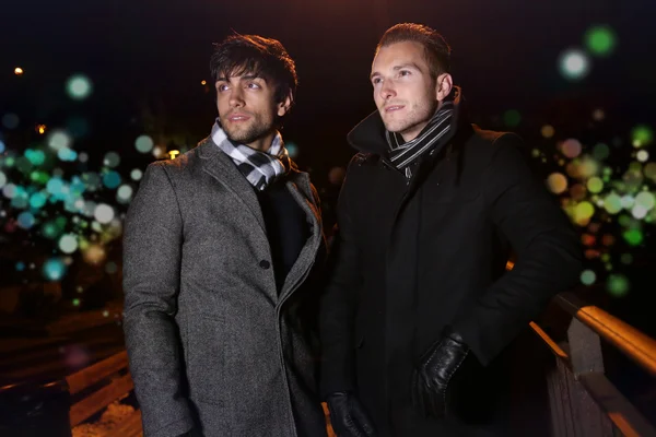 Two elegant men posing during the night — Stock Photo, Image