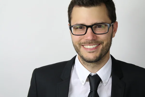 Sorrindo homem sobre um fundo branco — Fotografia de Stock