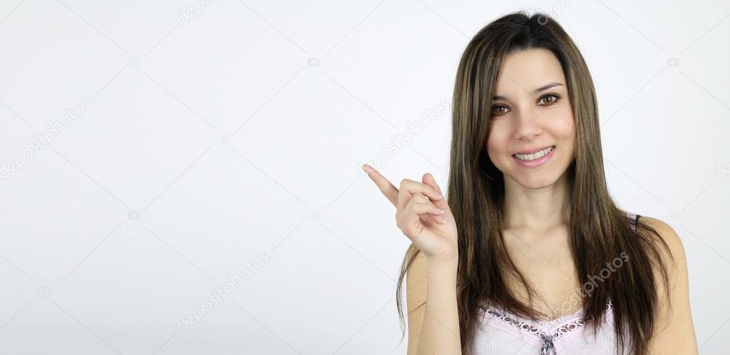 Beautiful woman pointing with his finger