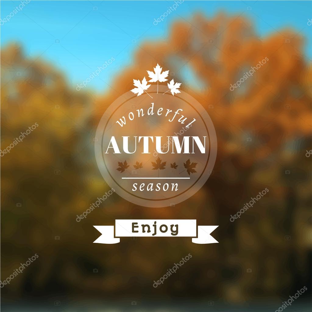 Poster with autumn landscape. Motto, slogan for autumn season. Maple leaves on a autumn forest background. Emblem for autumn poster. Circle emblem of wonderful autumn season on a photo background.