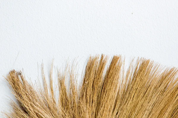 Old broom put on the wall — Stock Photo, Image