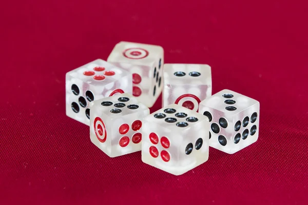 Transparent dice on a red felt — Stock Photo, Image