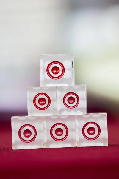 Transparent dice on a red felt — Stock Photo, Image