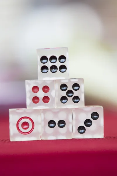 Transparent dice on a red felt — Stock Photo, Image