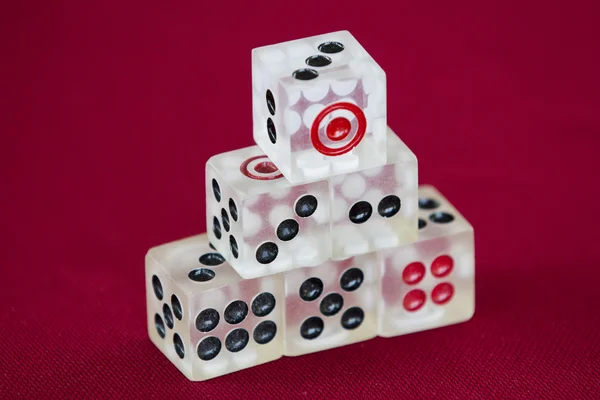 Transparent dice on a red felt — Stock Photo, Image