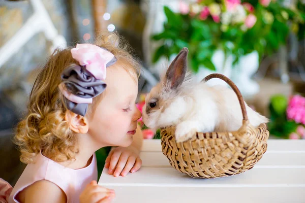 Little girl with a rabbit — Stock Photo, Image