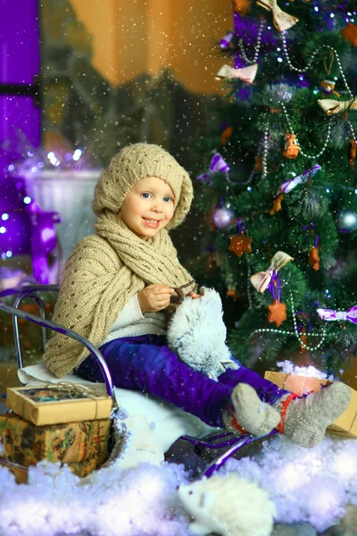 The girl near a Christmas fir-tree 5 Stock Photo