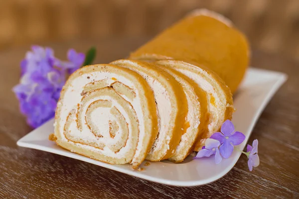 Roll with white cream — Stock Photo, Image