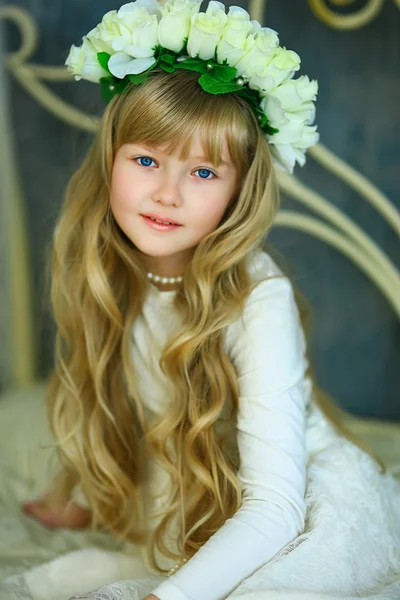 The girl with a wreath from white roses — Stock Photo, Image