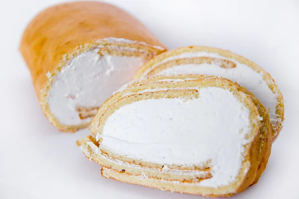 Roll with cream isolate — Stock Photo, Image