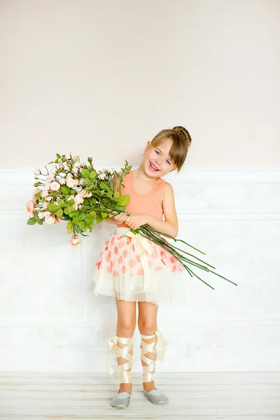 The girl the ballerina with flowers — Stock Photo, Image