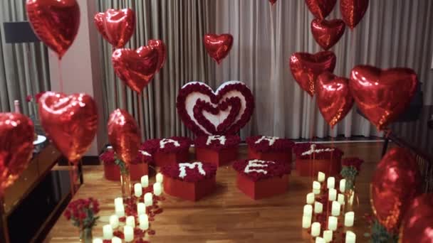 Romantic decor elements for marriage applications. Lots of heart-shaped roses. — Stock Video