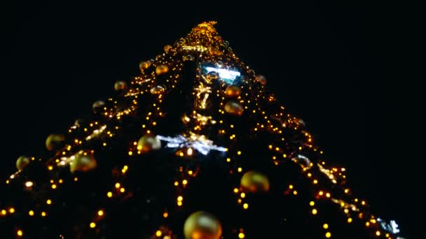 Moving bottom frame of a beautiful Christmas tree decorated — Stock Video