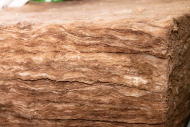Close up of a stack of thermal insulation mineral boards or glass wool, copy space clipart