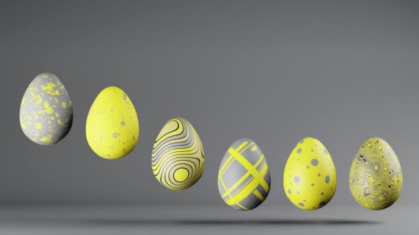 Підстрибуючи великодні яйця в трендових кольорах 2021 Освітлюючий і Ultimate сірий. Копіювати простір. 3D візуалізація — стокове відео