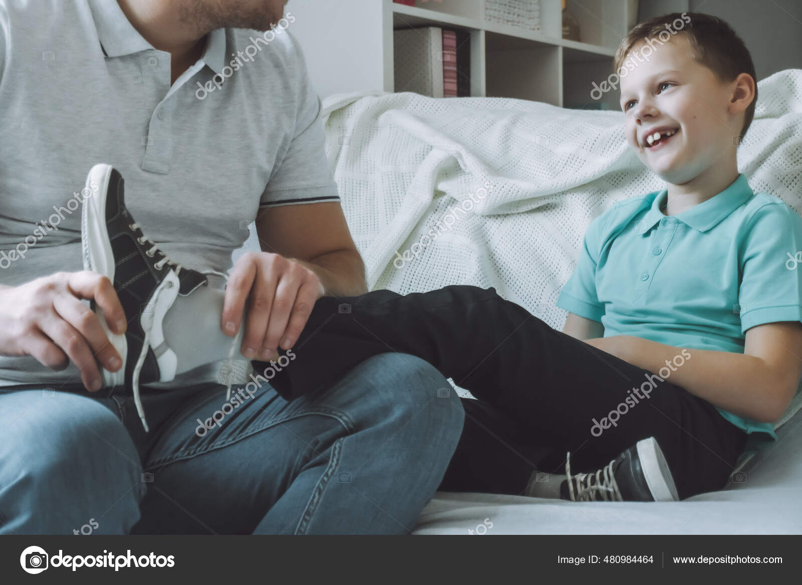 Dad Son Sitting Couch Father Helps Child Take Put Shoes — Stock