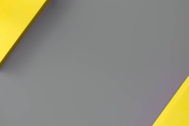 2021 Pantone Aydınlatma ve Nihai gri, minimalizm konsepti trend renklerinde soyut bir arka plan. Düz yatıyordu