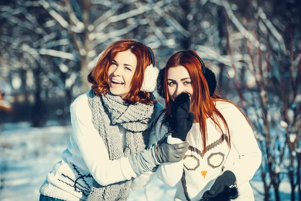 Two girl friends in winter outdoors — Stock Photo, Image