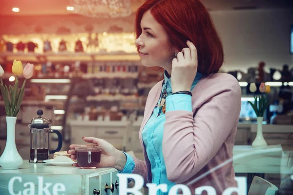 Young woman in cafe — Stock Photo, Image