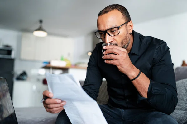 40 years old man accounting at home