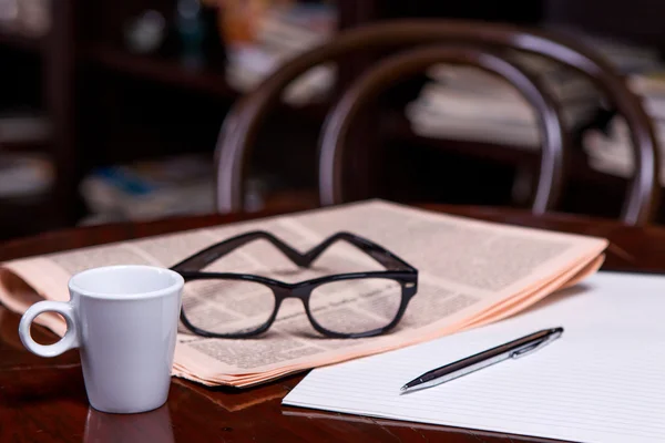 Cup of Coffee and Newspaper — Stock Photo, Image