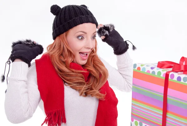 Woman surprised at receiving a gift — Stock Photo, Image