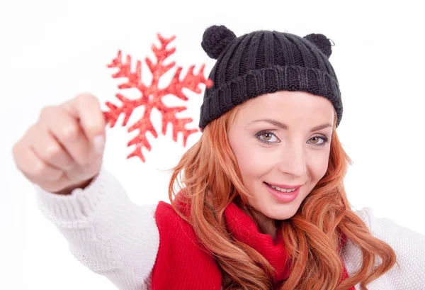 Woman holding christmas red star — Stock Photo, Image