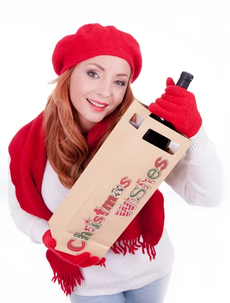 Woman holding a bottle of wine — Stock Photo, Image