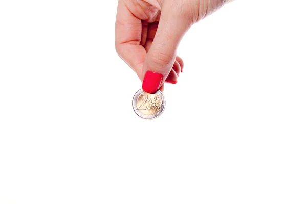 Woman hand holding euro coin — Stock Photo, Image