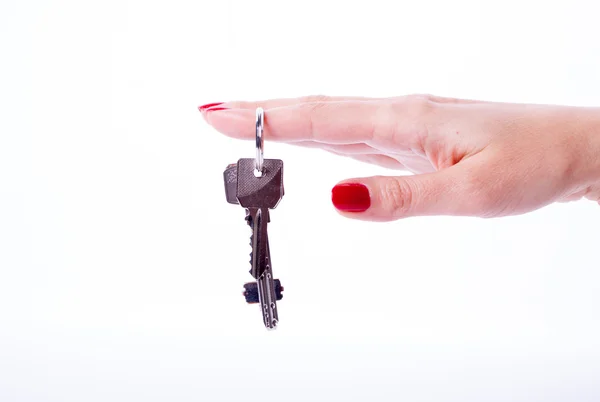 Mujer mano sosteniendo llaves — Foto de Stock