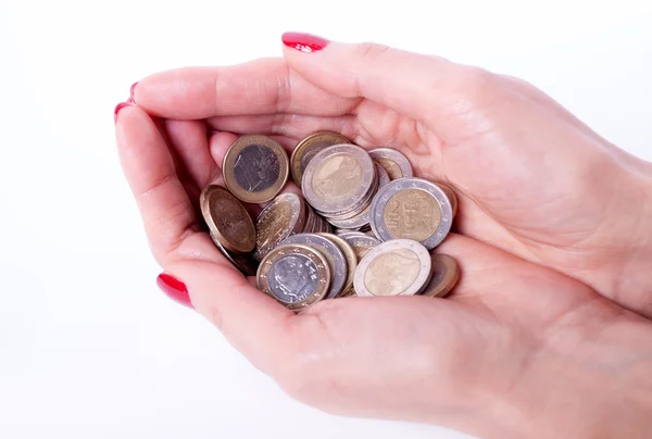 Female hand holding euro coin — Stock Photo, Image