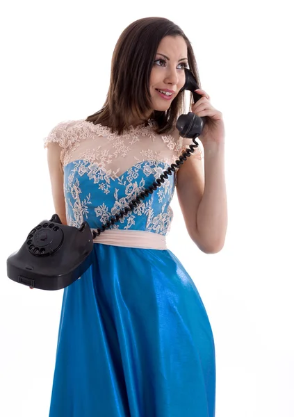 Foto da menina sorridente com telefone vintage — Fotografia de Stock